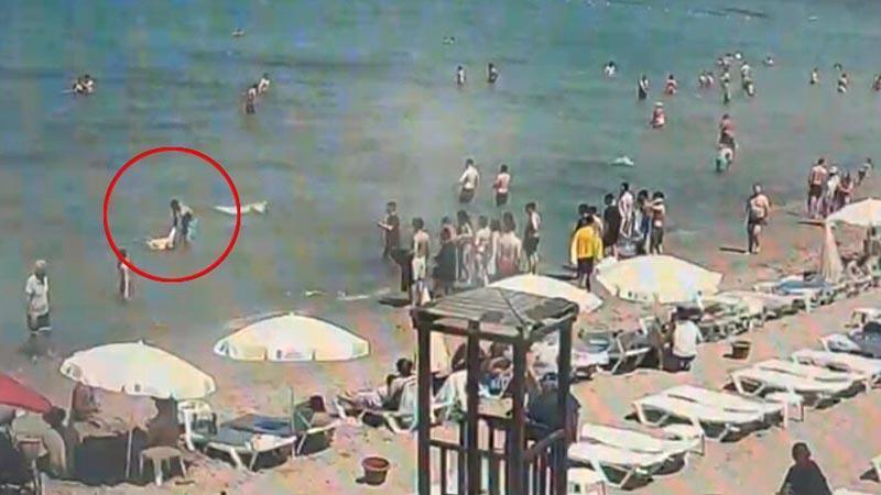 Denizde boğulma tehlikesi geçiren Çinli turist kurtarıldı; o anlar kamerada